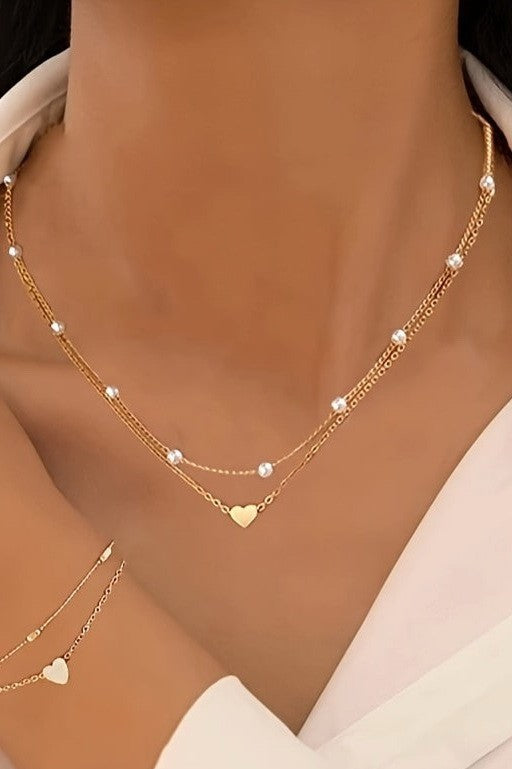 Gold heart/pearl layered necklace